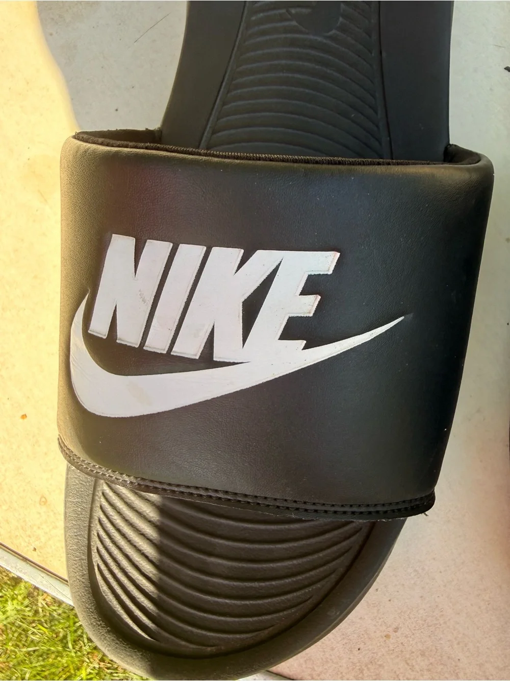 Men’s Nike Black Slides with White Logo